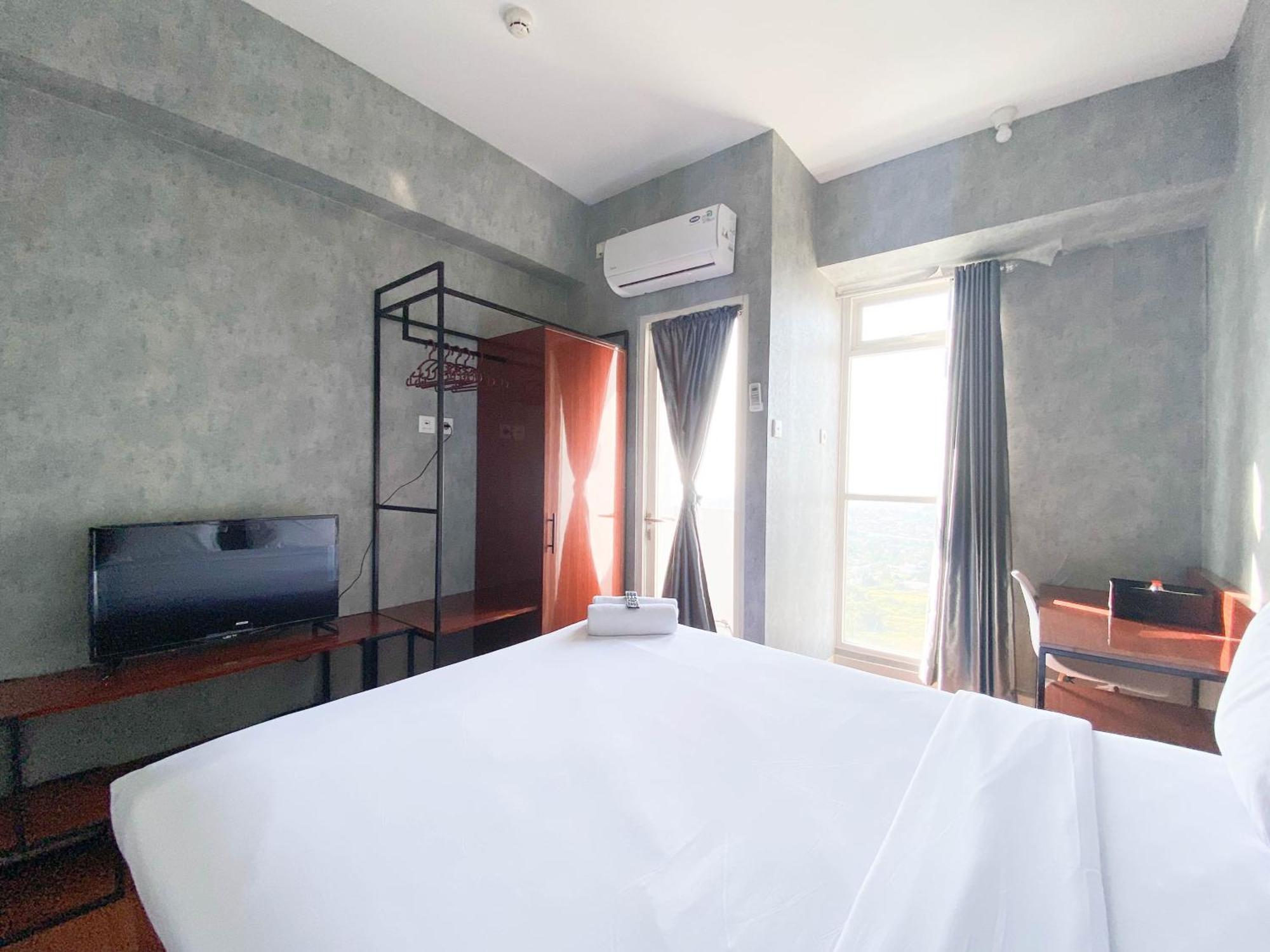 Homey And Good Choice At Amartha View By Travelio Apartemen